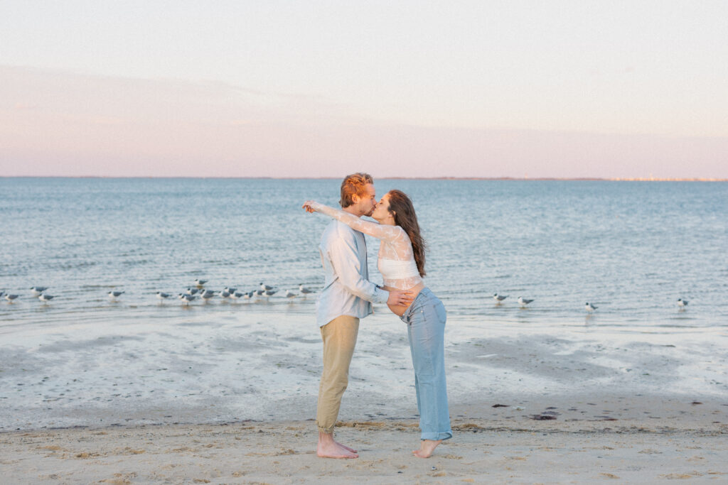 barnegat beach couple kissing maternity twilight