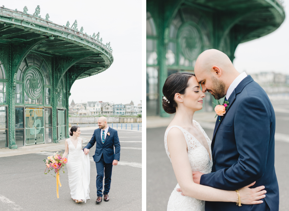 bride and groom walking embracing in front of asbury park carousel building