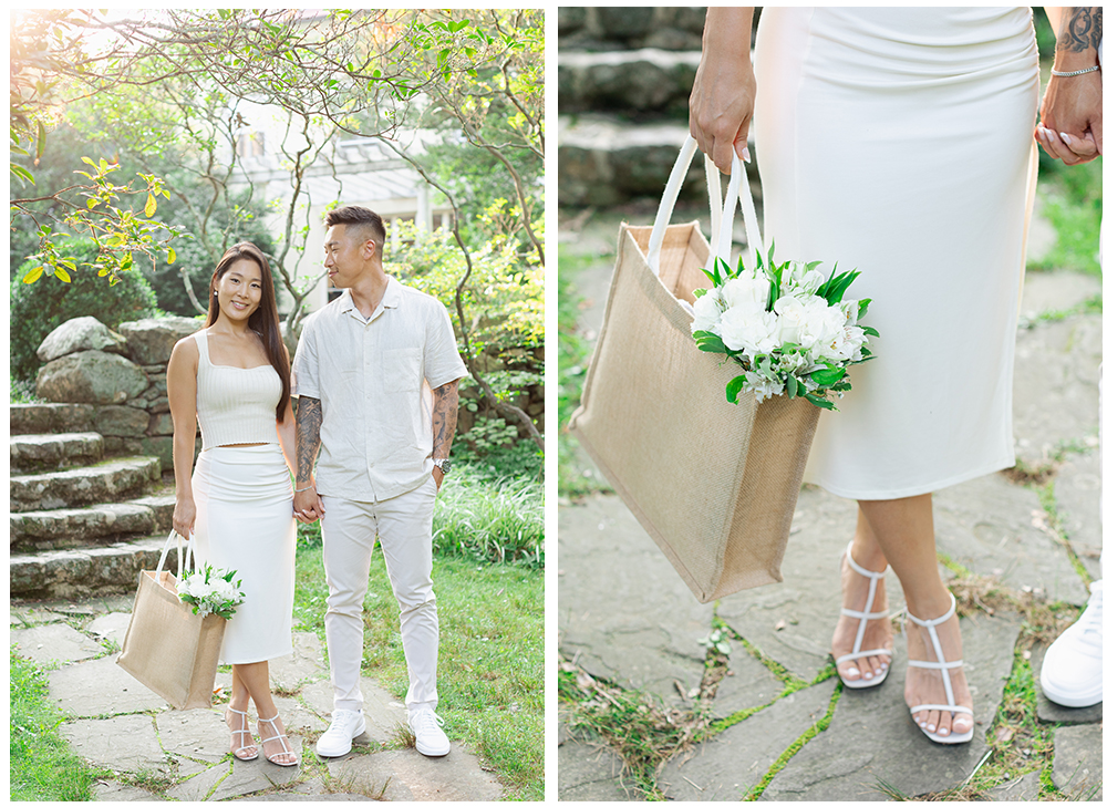 engaged couple walking through garden with bouquet in canvas bag cross estate gardens
