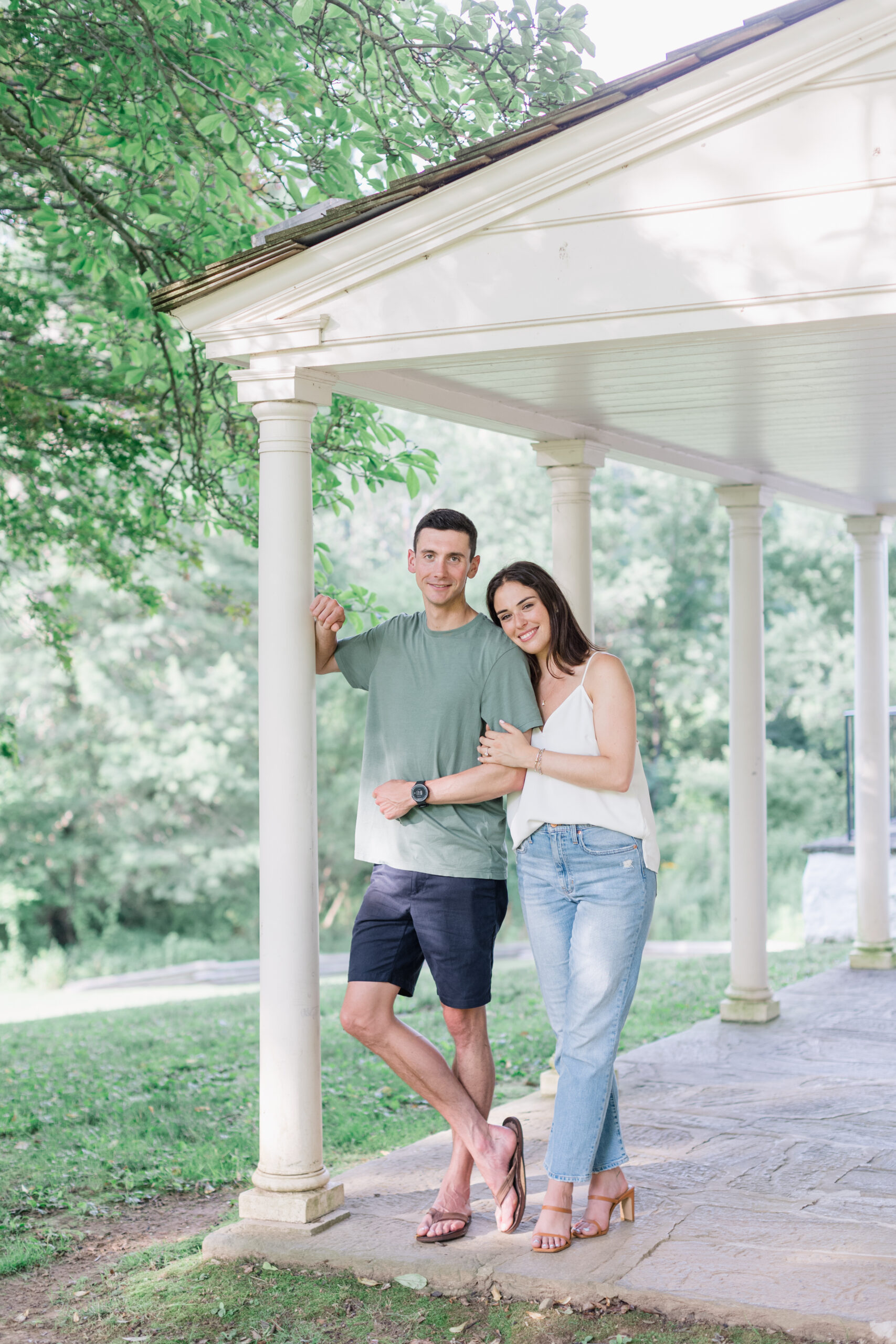 couple leaning on house at valley forge national park