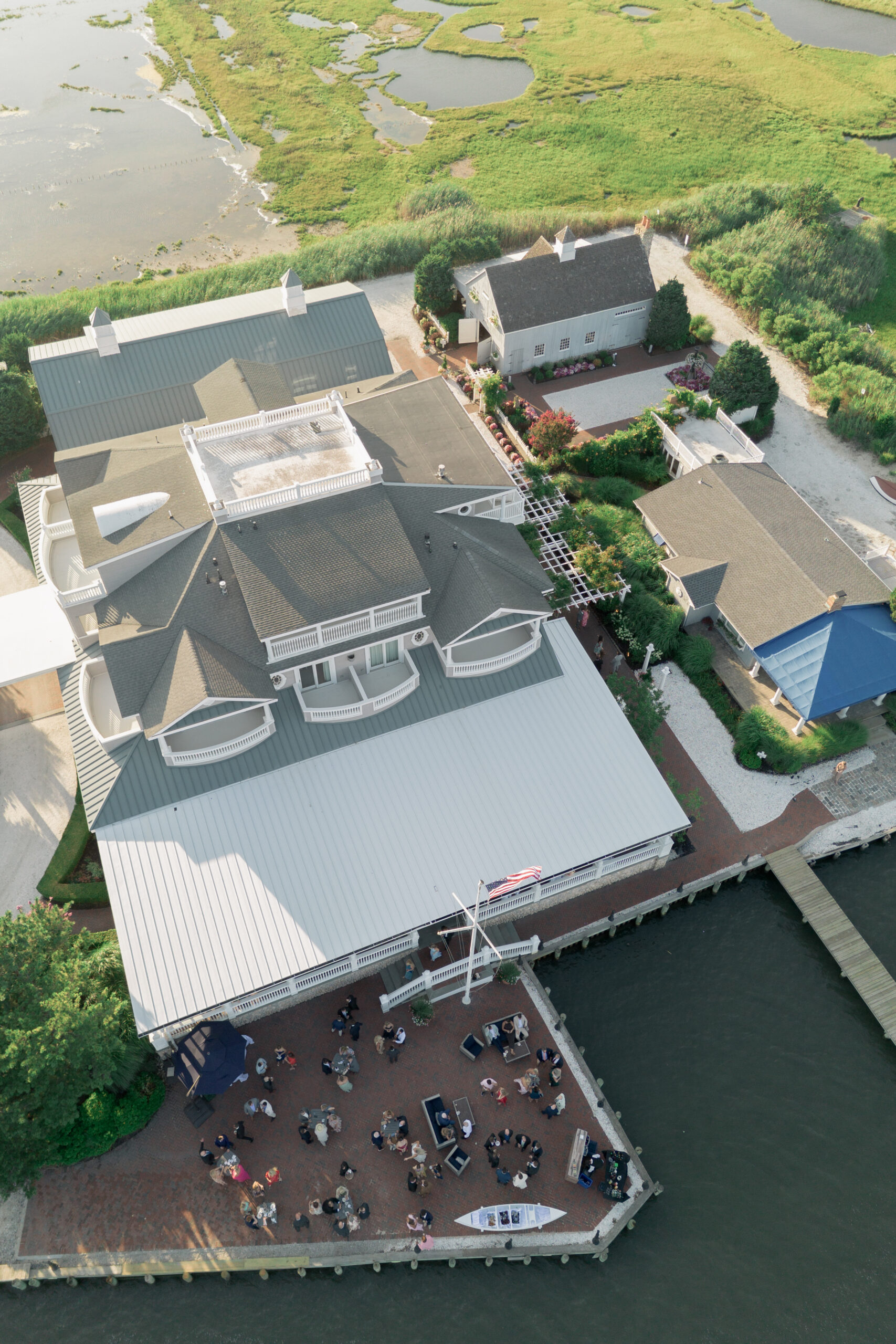 Aerial shot of Bonnet Island Estate wedding cocktail hour at sunset