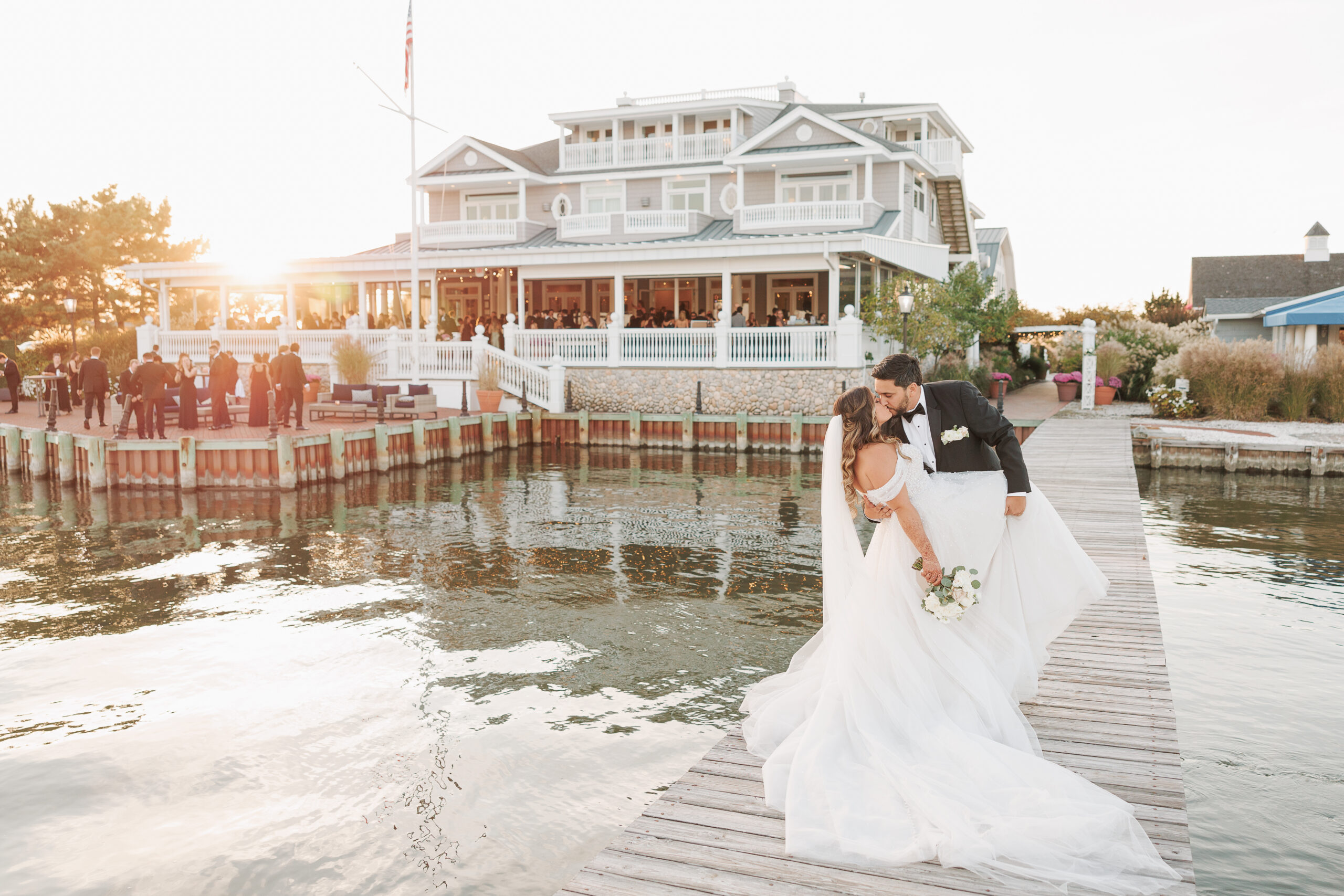 Bride and groom at Bonnet Island Estate overlooking Barnegat Bay on the New Jersey coast