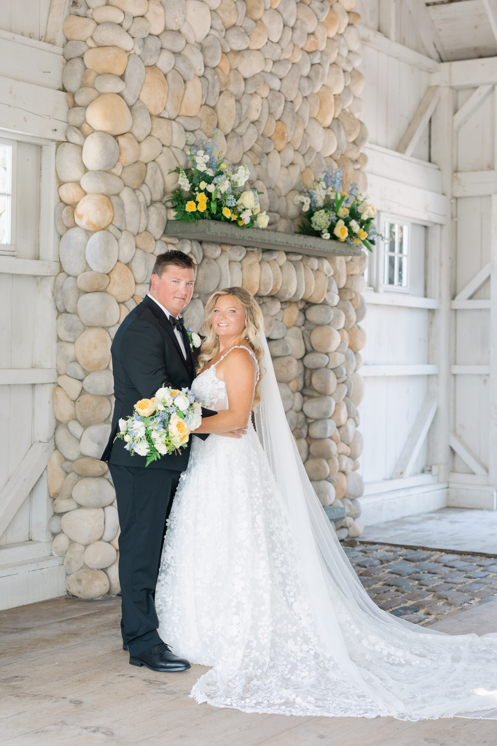 Interior of the Boathouse Chapel with whitewashed benches and timber beams during a Bonnet Island Estate ceremony