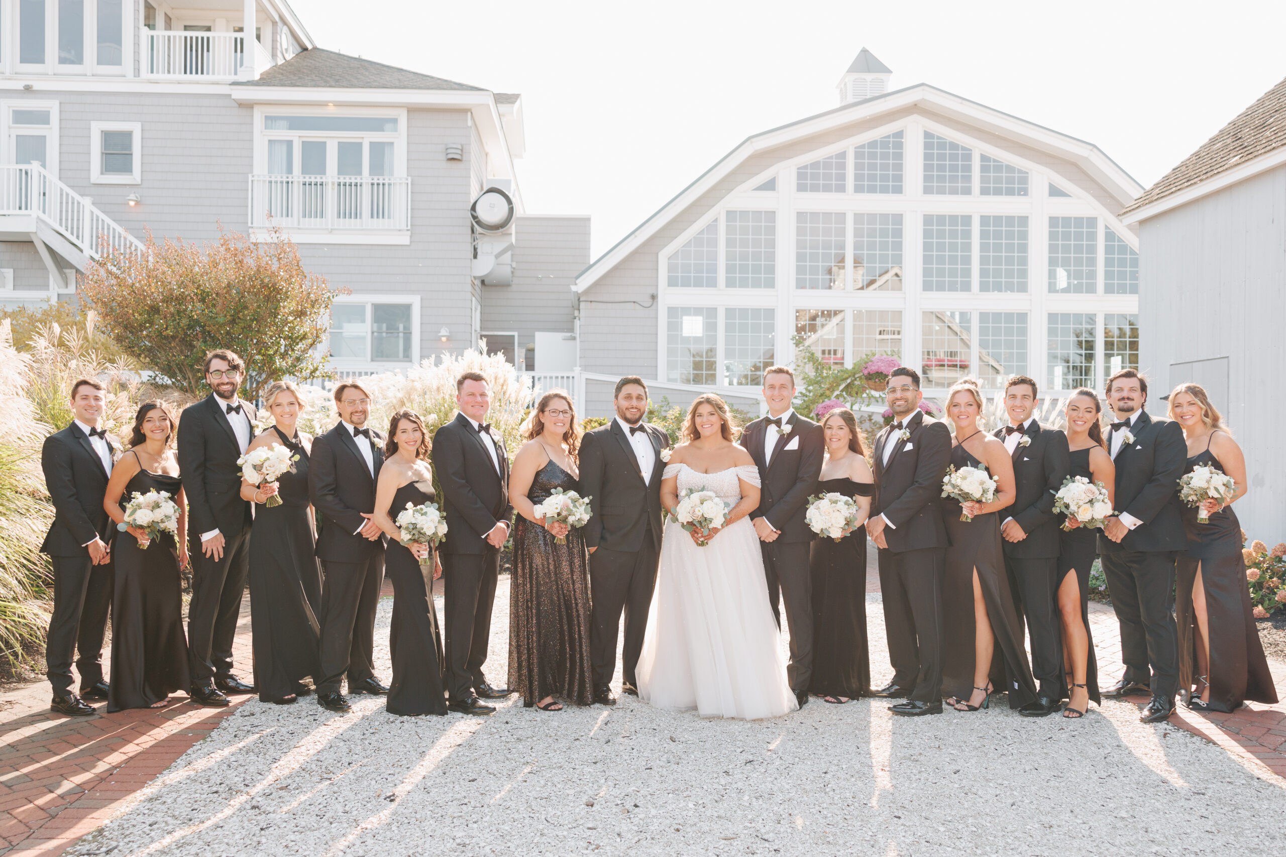 Wedding party portrait on the lawn overlooking Barnegat Bay at Bonnet Island Estate
